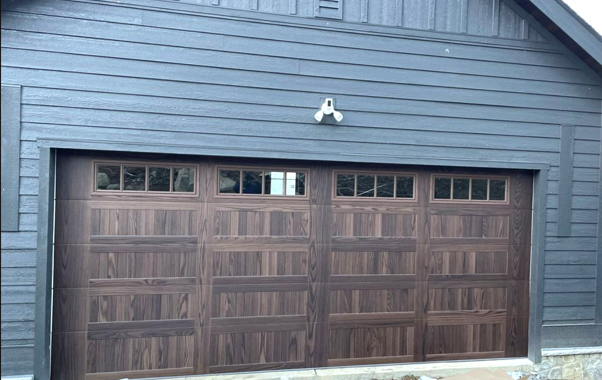 Professional technician providing local garage door repair services in Sarasota, FL, using specialized tools and equipment for high-quality results.