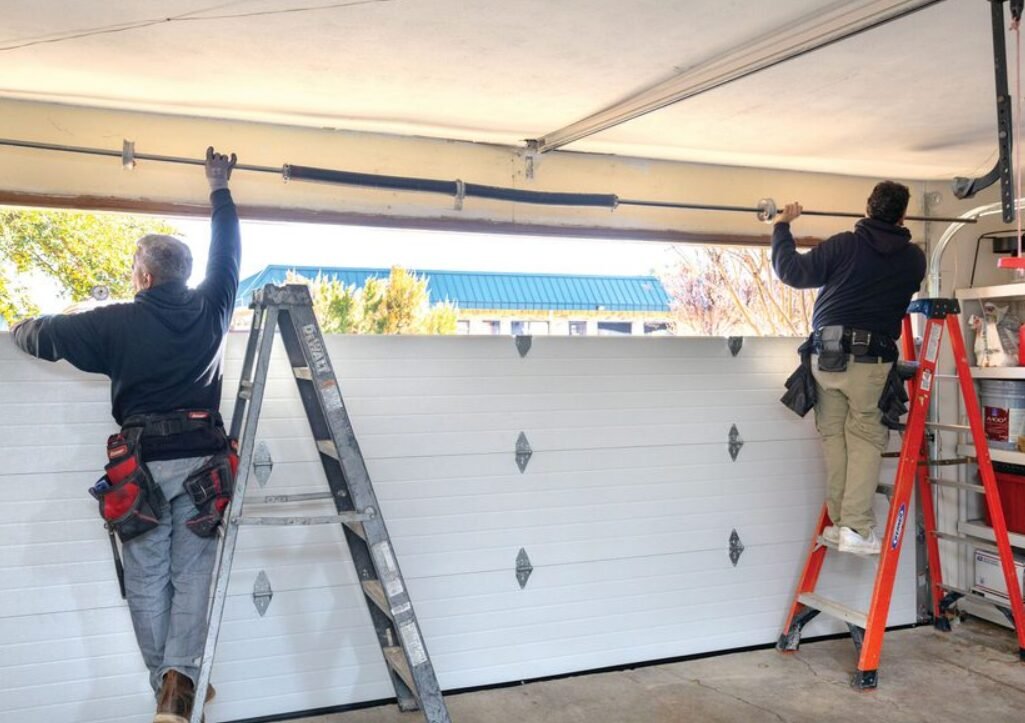 Technician providing professional local garage door repair services in Sarasota, FL, ensuring smooth and reliable operation